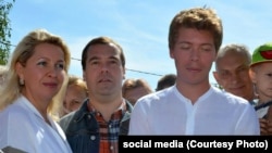 Ilya Medvedev (right), former Russian President Dmitry Medvedev (center), and Svetlana Medvedeva (left).