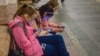 Russia -- Passengers at Arbatskaya Station