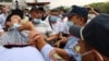 Kazakhstan. The police take away posters from the protesters. Almaty. July 6, 2021