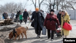 Мариуполь: смерть и разрушения в осажденном городе