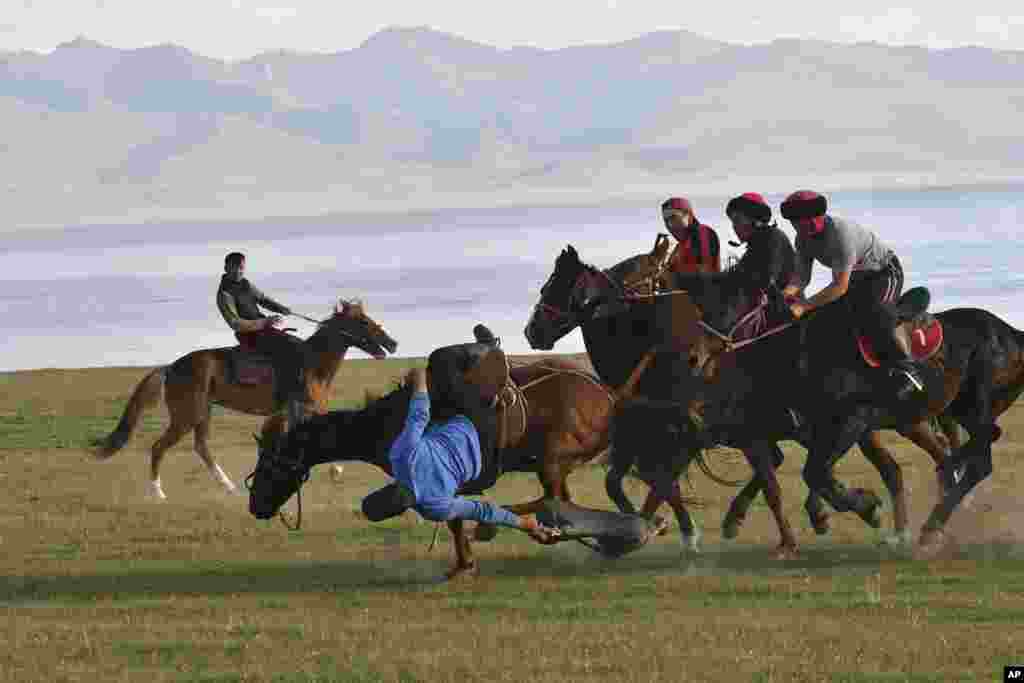 Participants at Gallops 2025 take part in a traditional game of Kok Boru in Kyrgyzstan. 