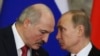 Russia – Russian President Vladimir Putin (R) and his Belarusian counterpart Alyaksandr Lukashenka talk a signing ceremony at a session of the Supreme State Council of the Union State at the Kremlin in Moscow, March 3, 2015