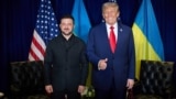 US President Donald Trump (right) gestures to reporters while at a bilateral meeting with Ukrainian President Volodymyr Zelenskyy in New York City on September 23. 